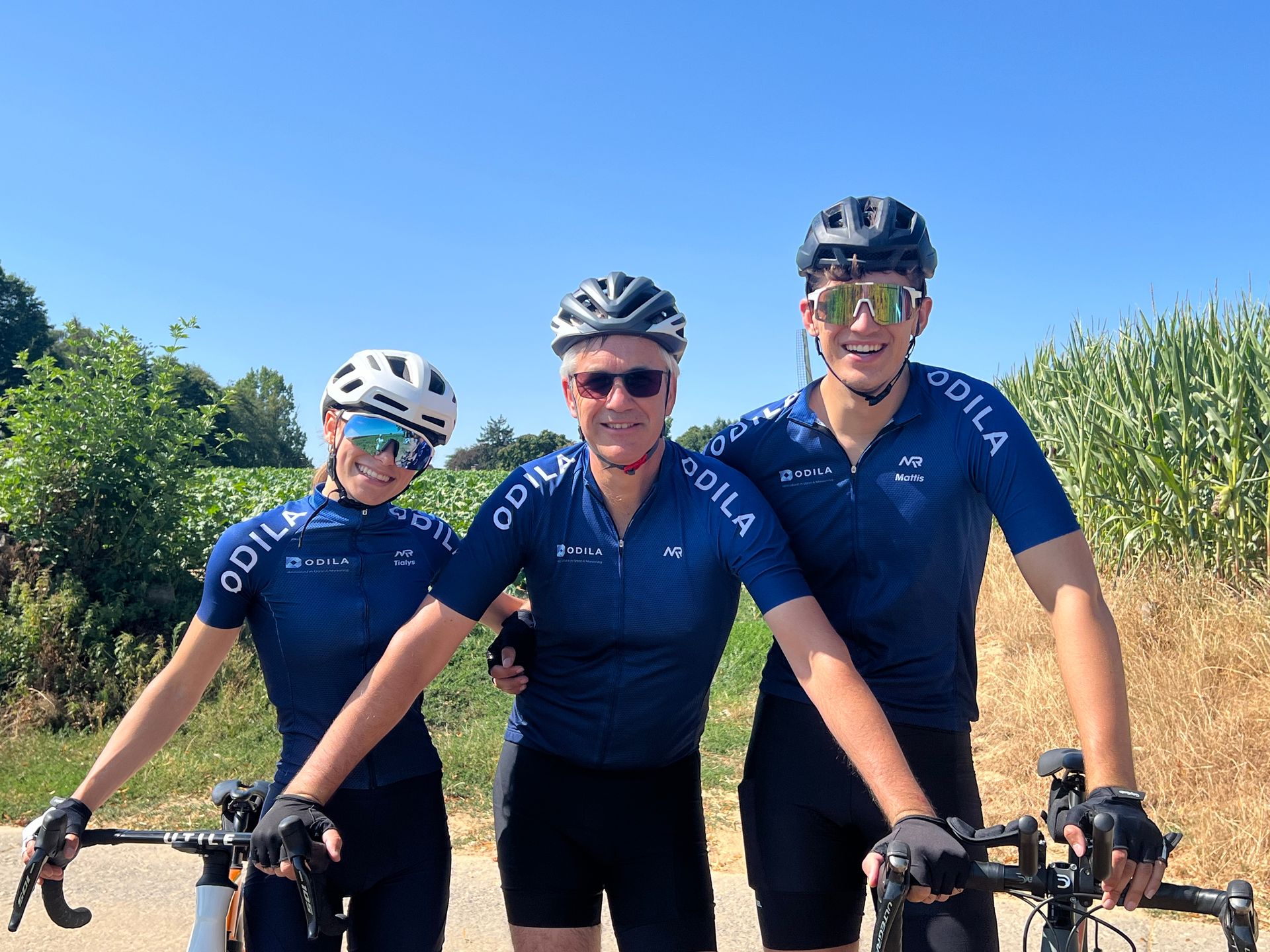 Colleagues cycling together in ODILA jerseys