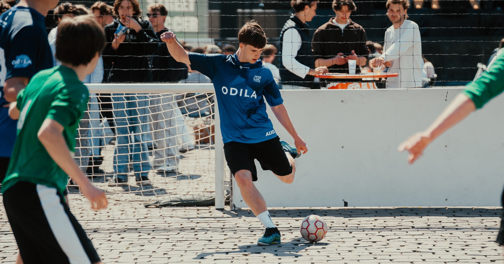 Football action in an ODILA shirt